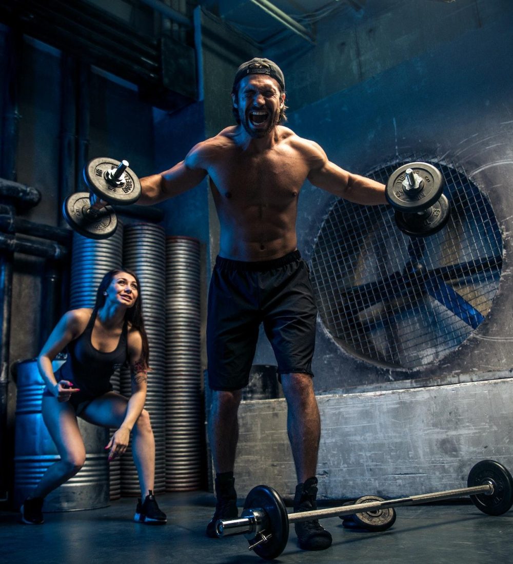 Couple training in a gym